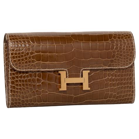 hermes constance crocodile clutch|Hermes constance long wallet price.